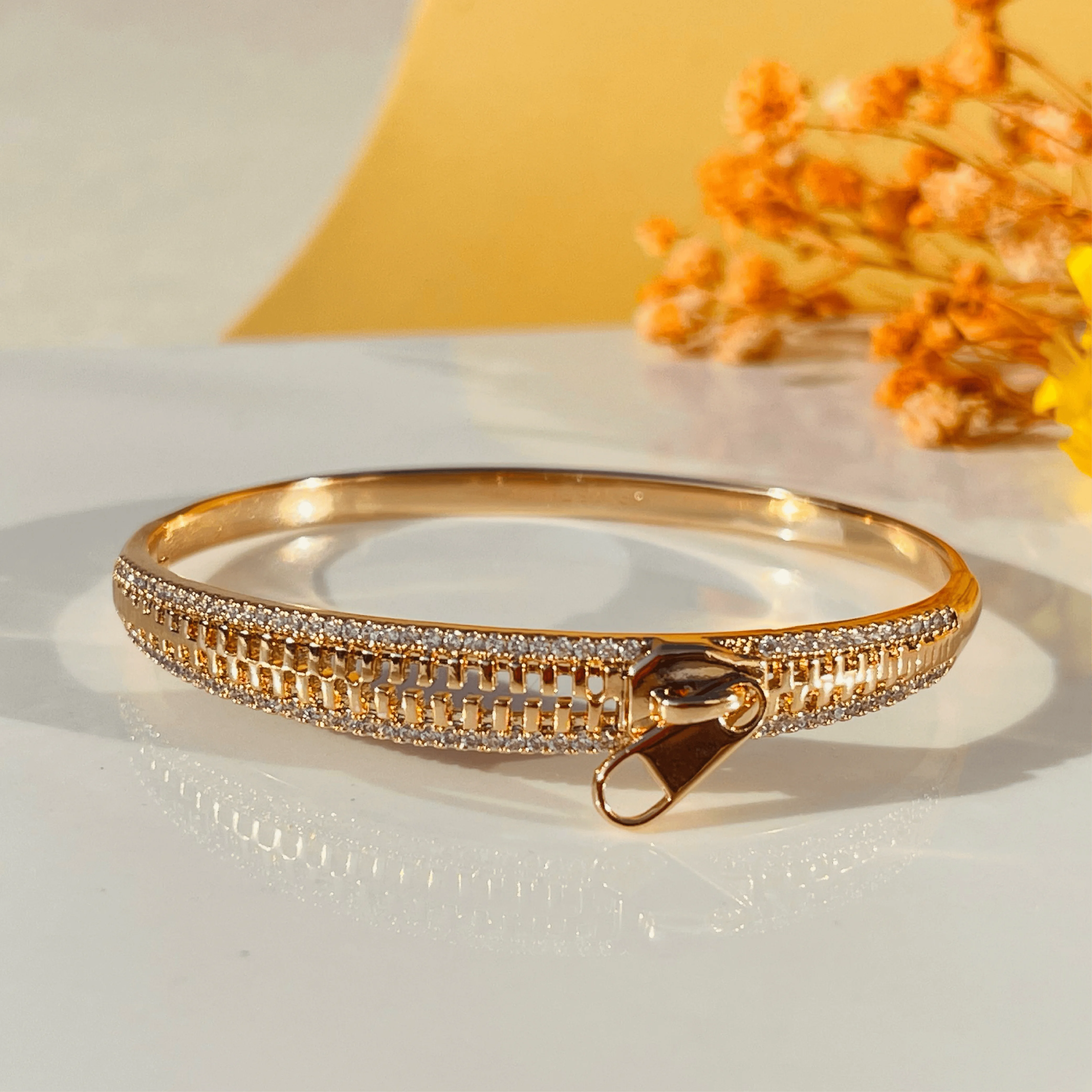 Golden Zip-Inspired Textured Statement Bangles