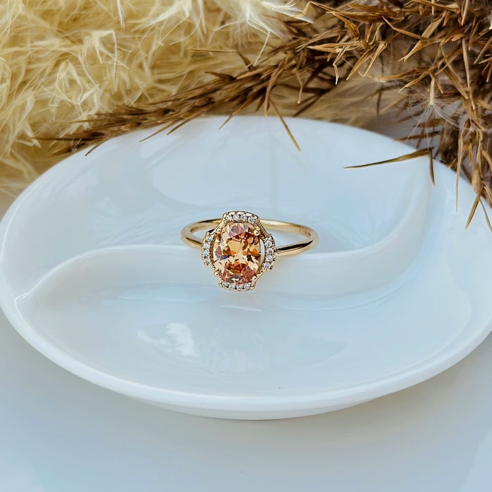The Amber Glow Oval Halo Ring