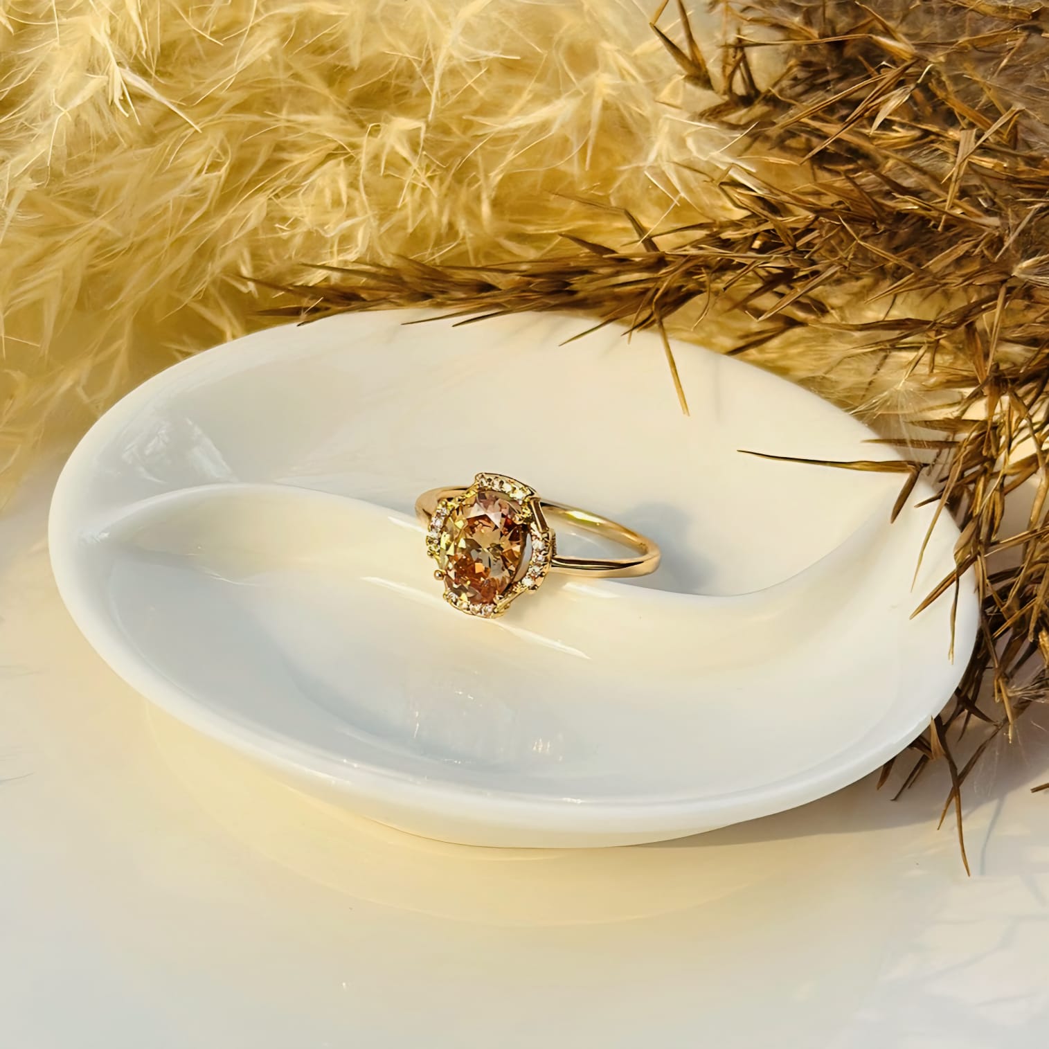 The Amber Glow Oval Halo Ring