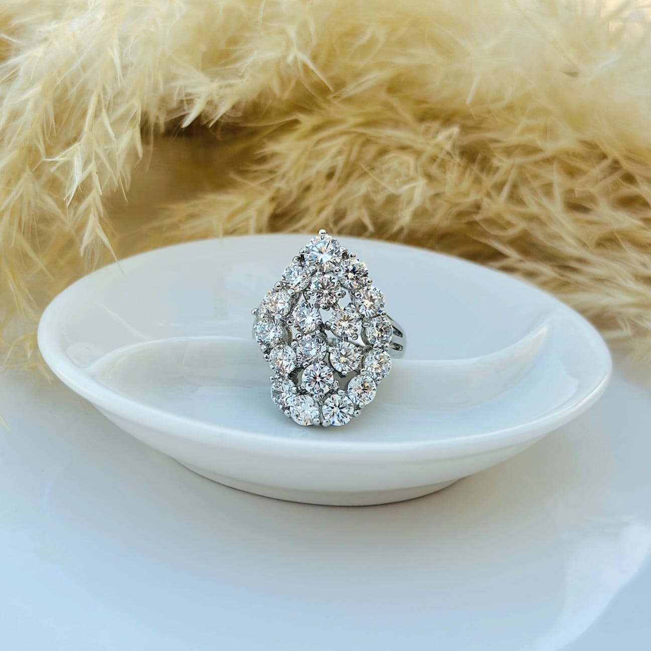 The Cascading Crystal Cluster Statement Ring