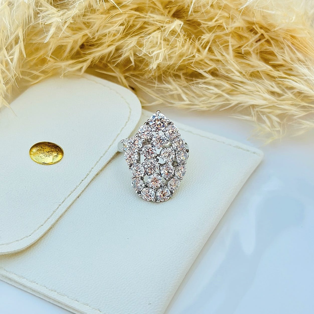 The Cascading Crystal Cluster Statement Ring