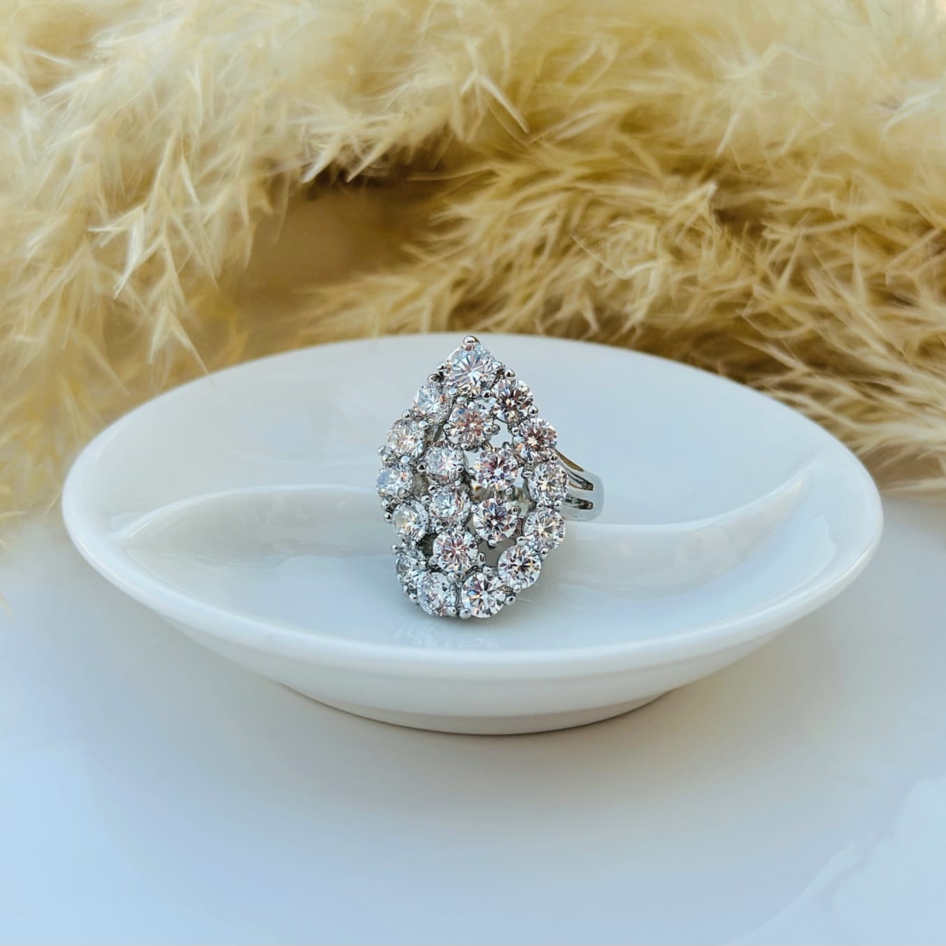 The Cascading Crystal Cluster Statement Ring