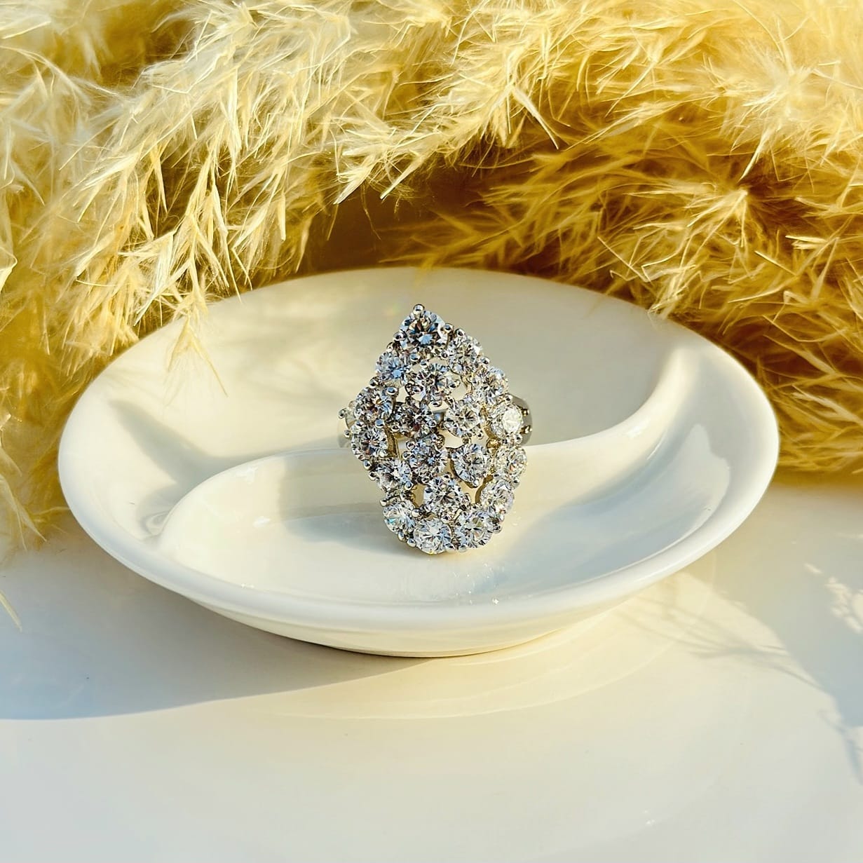The Cascading Crystal Cluster Statement Ring