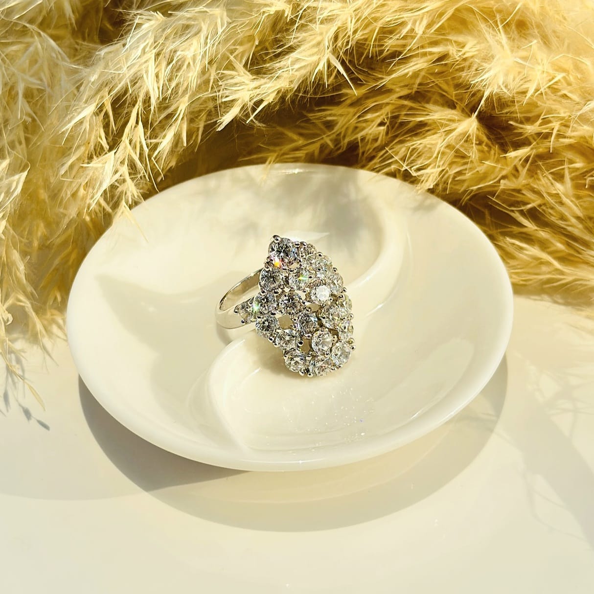 The Cascading Crystal Cluster Statement Ring