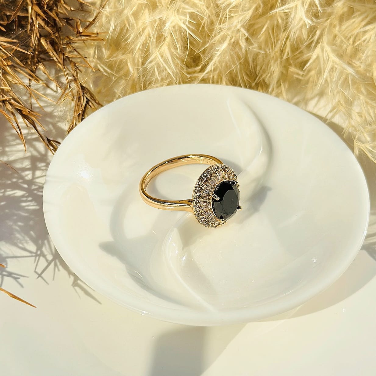 The Midnight Eclipse Oval Halo Ring