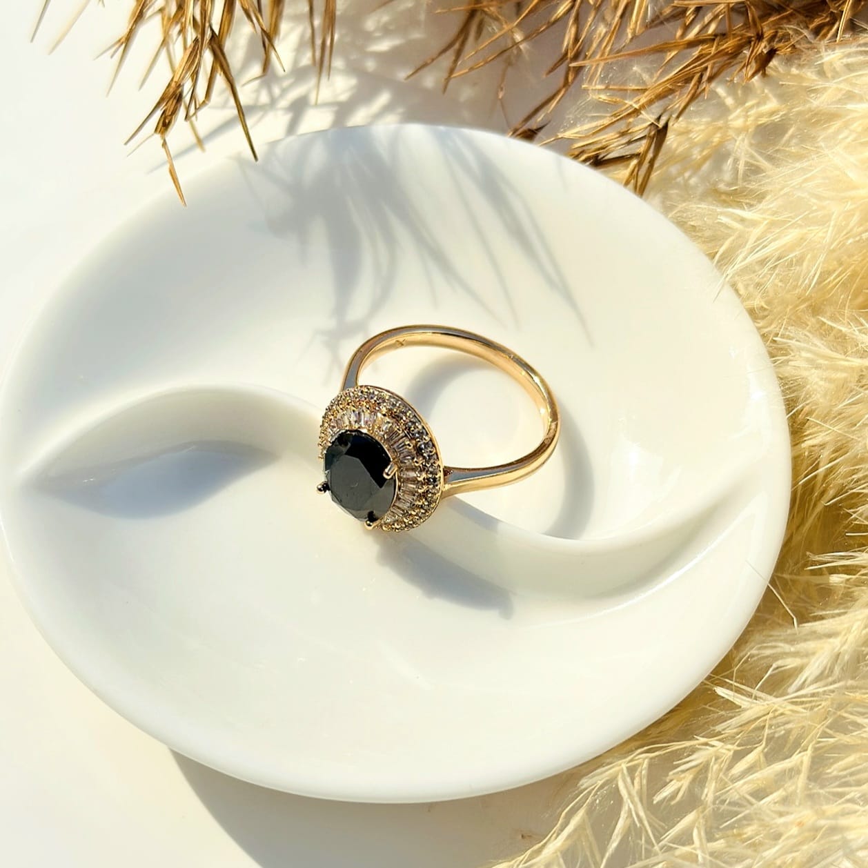 The Midnight Eclipse Oval Halo Ring