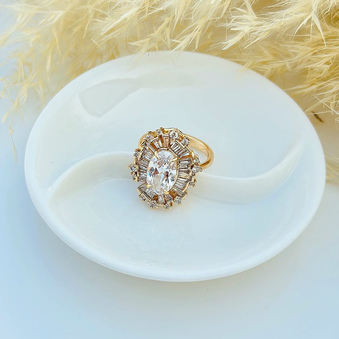 The Sunburst Baguette Halo Ring