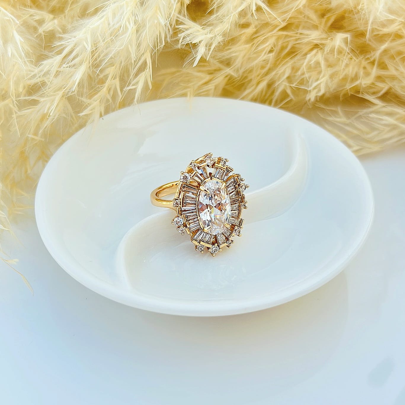 The Sunburst Baguette Halo Ring